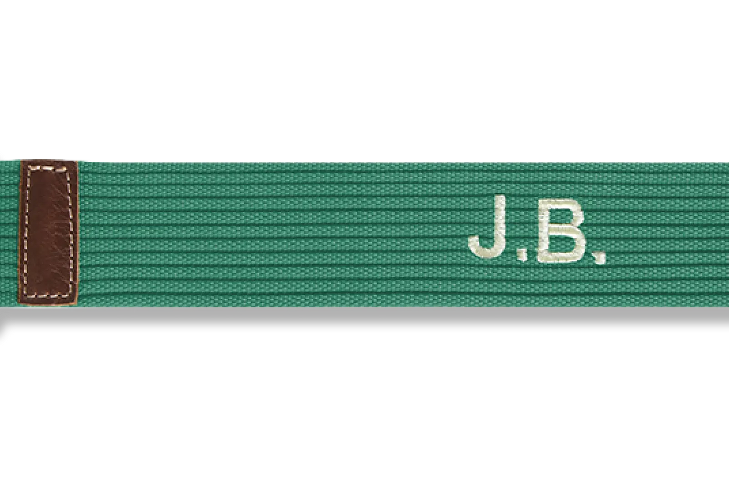 Green belt with 'J.B.' embroidery on a white background