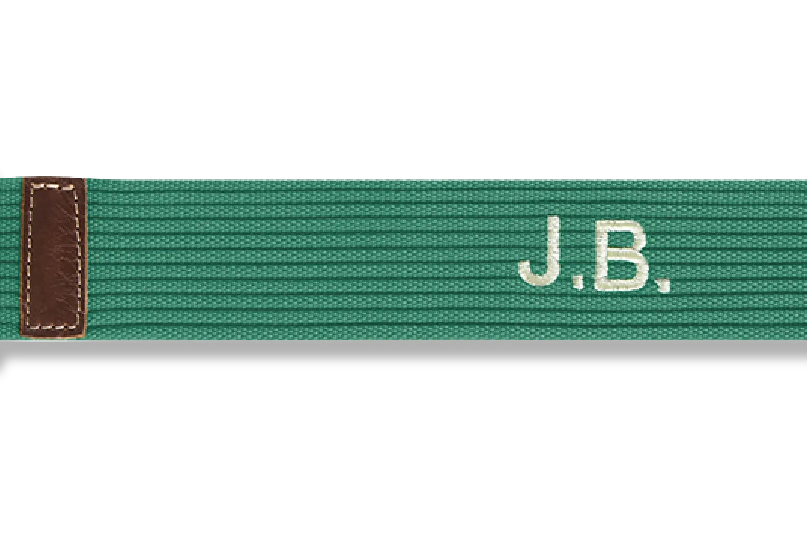 Green belt with 'J.B.' embroidery on a white background